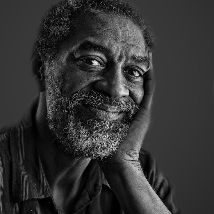 Kaveri Mehta, Lead Design Curator at Quay Summer Moss, reviewing corporate floral arrangements